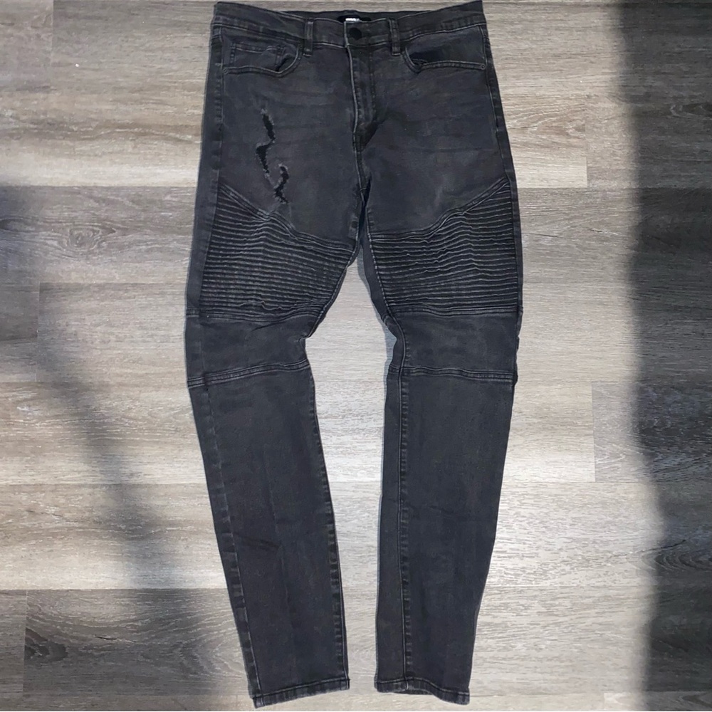 black denim distressed jeans